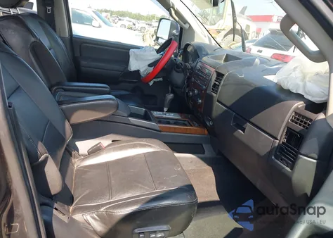 2012 Nissan Titan Pro-4X/S/Sl/Sv z USA, uszkodzony, nr VIN 1N6AA0EC9CN313315